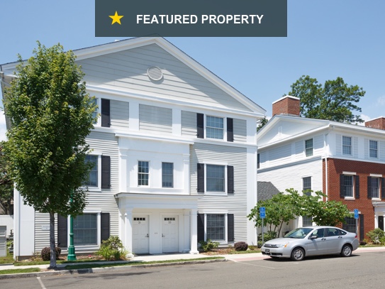Dual-family, multi-location units showing a bright and inviting exterior with spacious on-street parking.